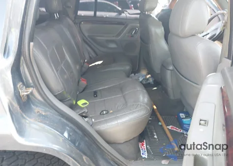 2001 Jeep Grand Cherokee Limited z USA, uszkodzony, nr VIN 1J4GW58N41C654035